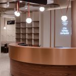 Manufacturing built-in storage systems Installation of a shelving complex with open shelves for small decor. Concealed furniture fasteners to load-bearing walls in the interior of a medical facility.
