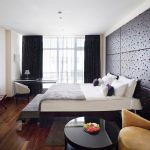 Spacious bedroom in a luxury hotel: professional photography by Kirill Toll. The composition emphasizes the room's size and premium amenities, showcasing how expert imagery can significantly boost your property's online appeal and bookings.