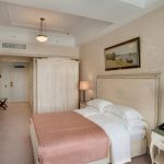 Hotel room photography with mixed lighting sources. This professional image by Kirill Toll captures the ambiance of a Russian hotel interior. Available for assignments in Moscow region towns including Khimki, Dolgoprudny, Lobnya.