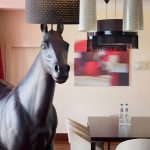 Why is professional interior photography key for hotel marketing? This image by Kirill Toll answers with a beautifully lit shot of a cozy nook, emphasizing texture and atmosphere to create a compelling online presence for the hotel.