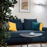 Professional photography of a two-storey hotel room interior. This shot by Kirill Toll showcases the unique layout and stylish decor, emphasizing the space's functionality. Need high-quality images for your hospitality website?