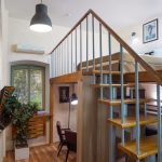 What is the key to successful hotel photography? This image from a Moscow two-storeyed room by Kirill Toll shows how attention to detail and composition creates desirable and marketable images for the hospitality industry.