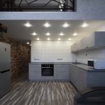 Холодильник и кухня на первом этаже