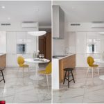 Светлая современная кухня в ЖК Сады Пекина с белым круглым столом, жёлтыми стульями, деревянными нижними шкафами и мраморным полом — фото Кирилла Толль