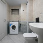 Гардеробная в двухуровневых апартаментах в Павшино